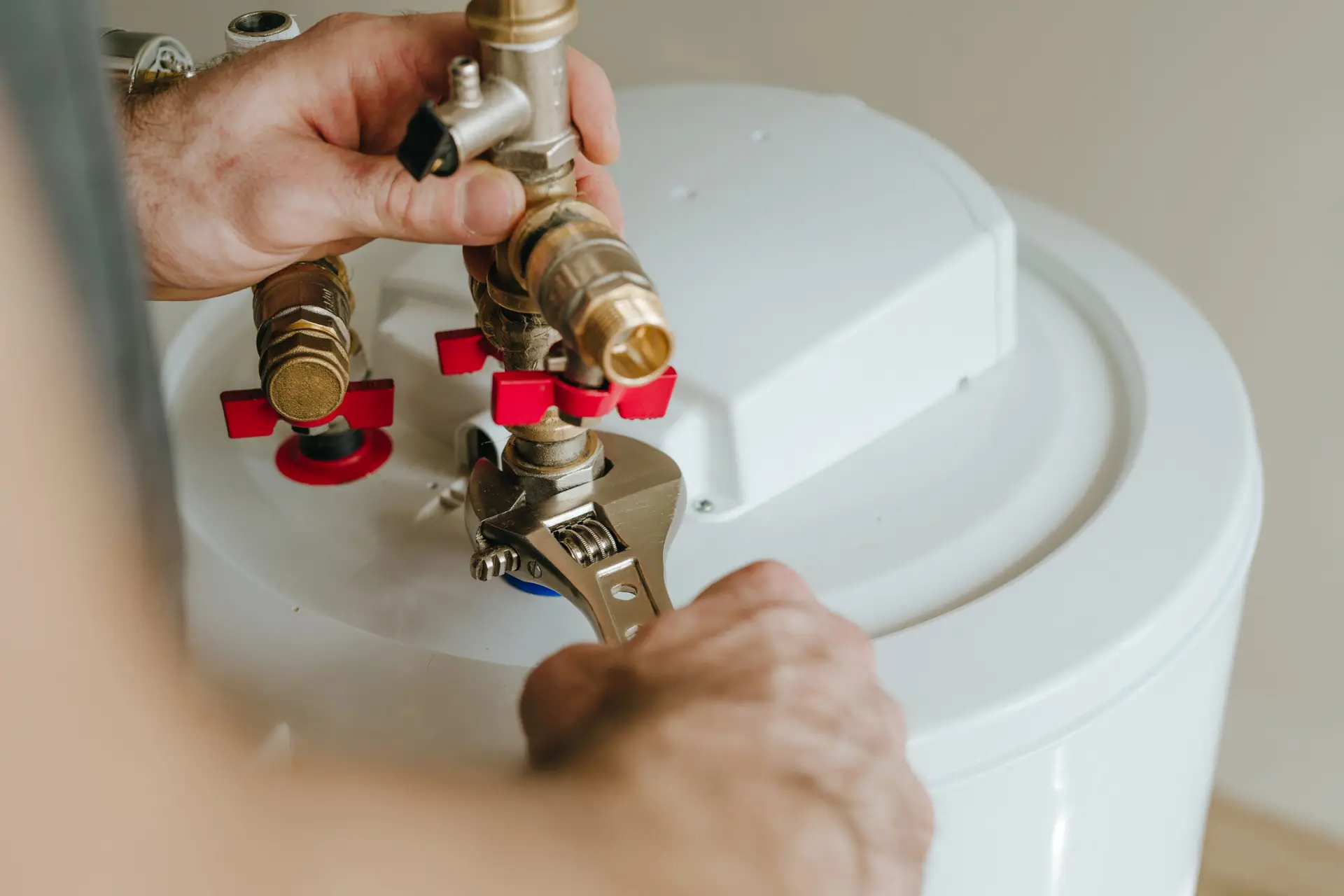 Plumber working on a water heater