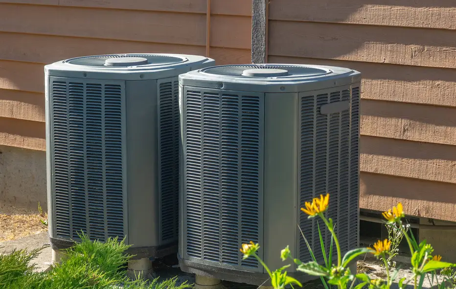 AC unit sitting outside of a home